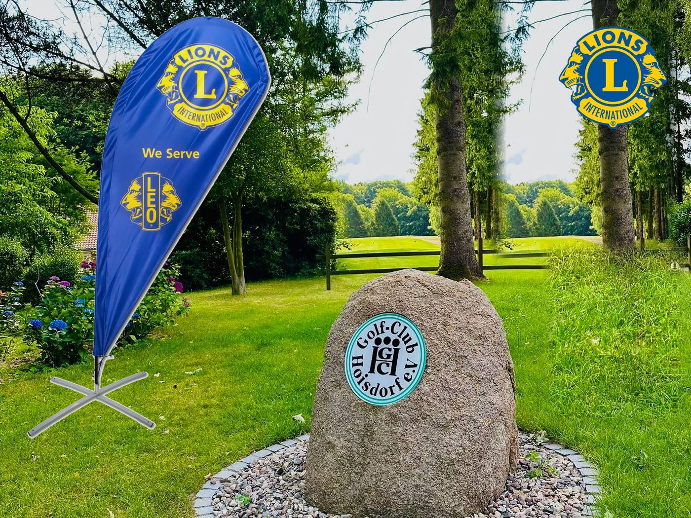 Findling mit dem Wappen des Golf-Clubs Hoisdorf, davor eine Lions-Fahne auf dem Rasen
